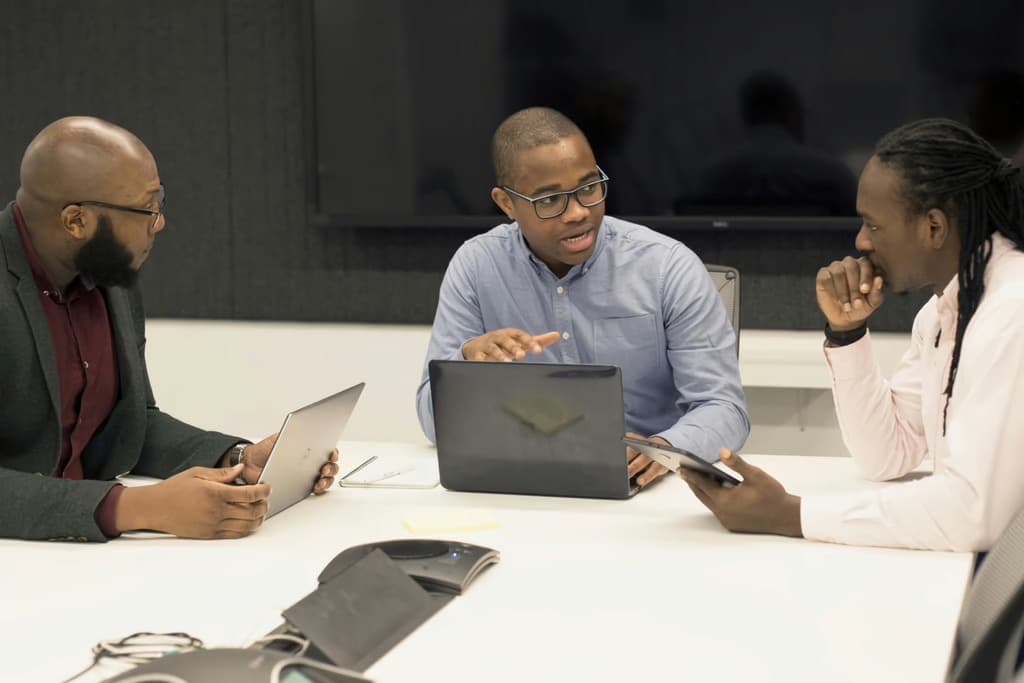 Arismile Advisory consultants in a strategy meeting